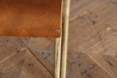 vintage plywood stacking chair close up